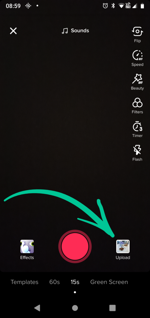Just click the upload button located in the bottom right corner of TikTok’s video shooting page